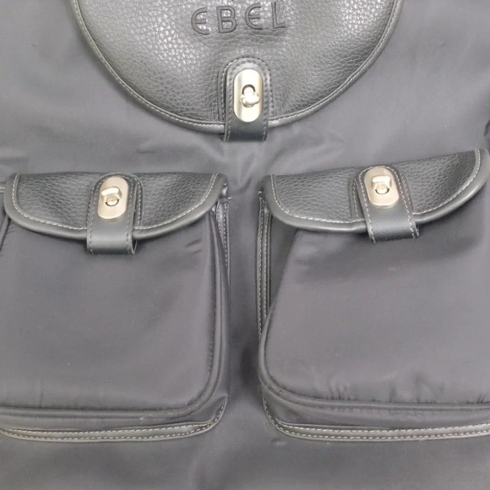 Ebel Black Nylon Faux Leather Turn Lock Cinch‎ Top Travel Backpack